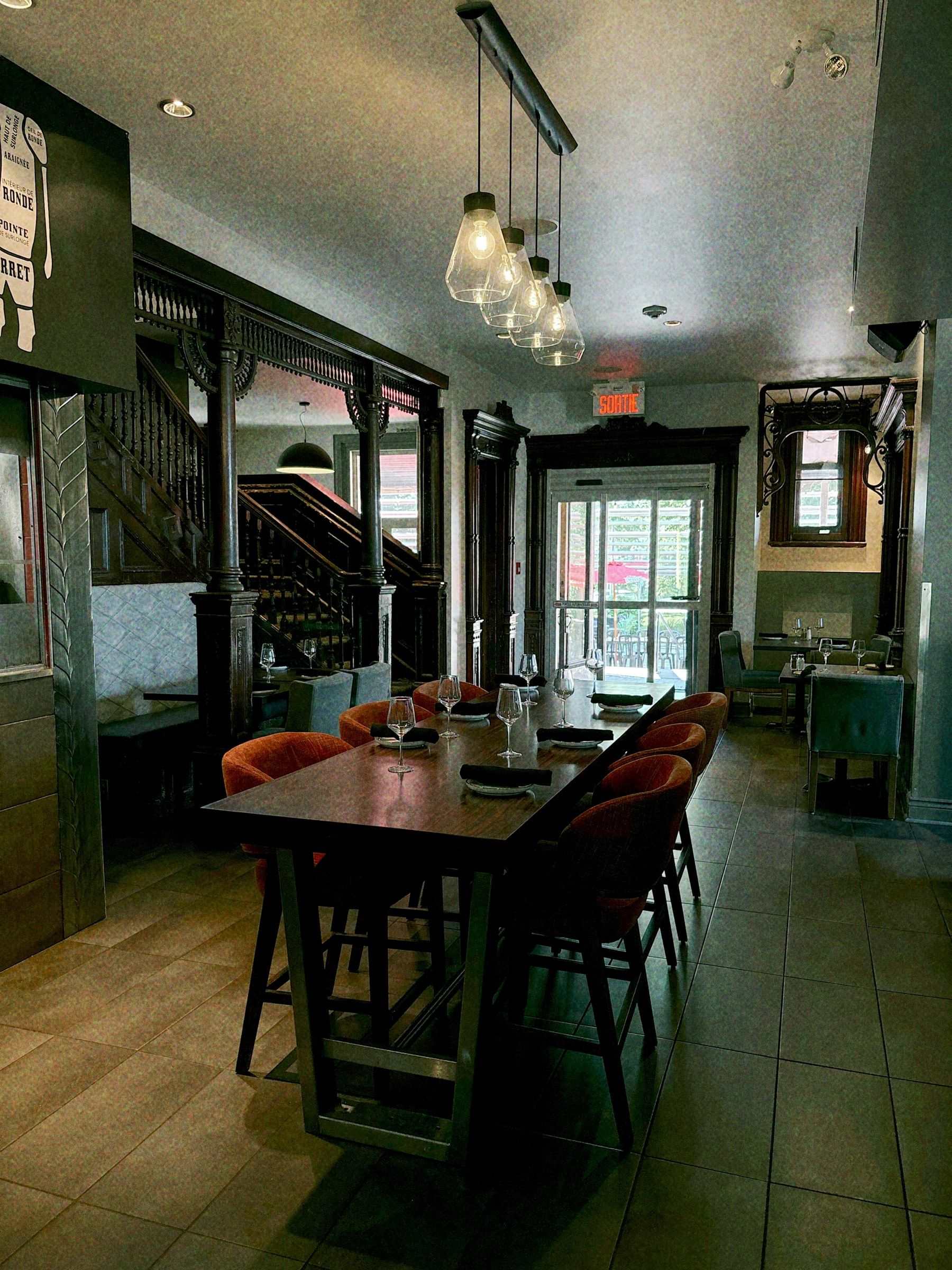 Overview of the Club Touriste main dining room from the entrance